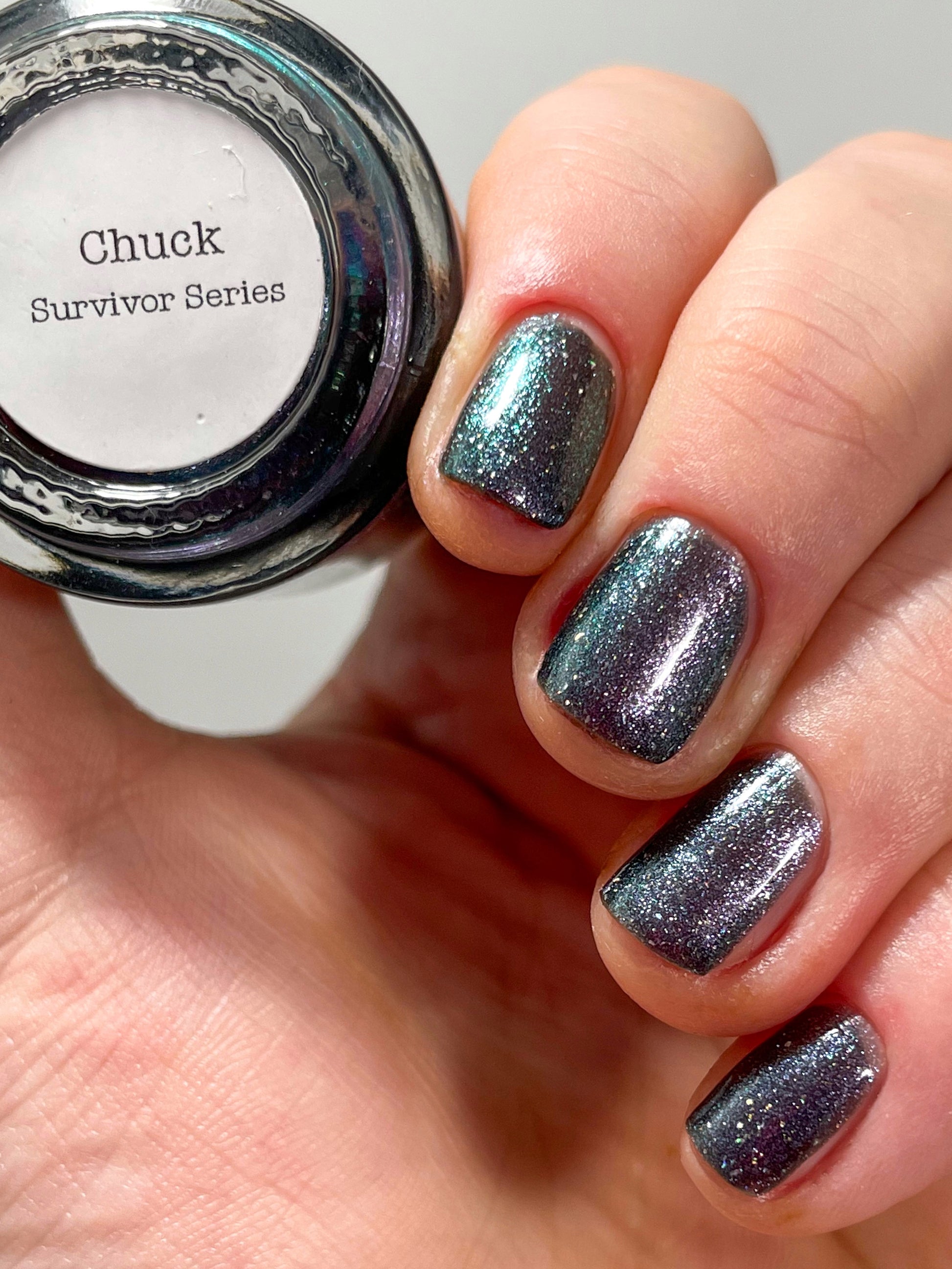 Chuck - Black Shimmer Nail Polish - Survivor Series - Dam Nail Polish